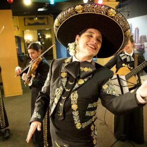 Veronica Robles rehearsing with her mariachi band in East Boston. (Robin Lubbock/WBUR)