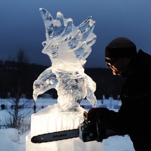 Slovakian artist Stefan Bankovich works on his ice sculpture during the Polo on snow tournament J&T Banka Trophy 2010 at Slovakia's High Tatra mountain resort Strbske Pleso on February 05, 2010. AFP PHOTO / JOE KLAMAR (Photo credit should read JOE KLAMAR/AFP/Getty Images)