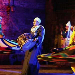 epa09888868 Egyptians members of the 'Tanoura Dance Troupe' perform during the holy month of Ramadan, at the Ghouri complex, in Islamic Cairo, Egypt, 13 April 2022. Muslims around the world celebrate the holy month of Ramadan by praying during the night time and abstaining from eating, drinking, and sexual acts during the period between sunrise and sunset. Ramadan is the ninth month in the Islamic calendar and it is believed that the revelation of the first verse in the Koran was during its last 10 nights EPA/KHALED ELFIQI