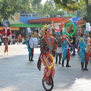 "Guangzhou, China - December 26, 2010: unidentified clown rides a monocycle in the christmas celebration of Changlong theme park"