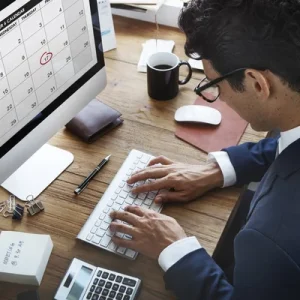 depositphotos_137511306-stock-photo-businessman-working-with-computer
