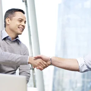 depositphotos_97411420-stock-photo-businesspeople-shaking-hands