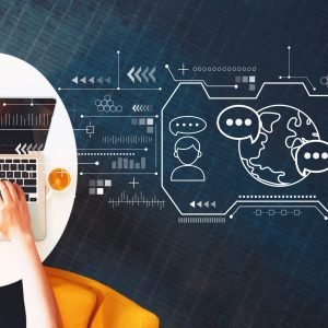 Learning Language concept with person using a laptop on a white table