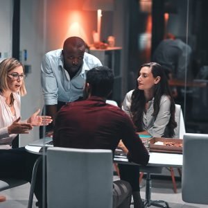 Business,Discussion,,Laptop,And,Planning,For,Design,At,Night,In